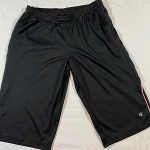 Workout shorts, black with pink striping.